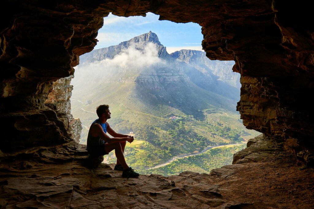 Man sitting in the mountains